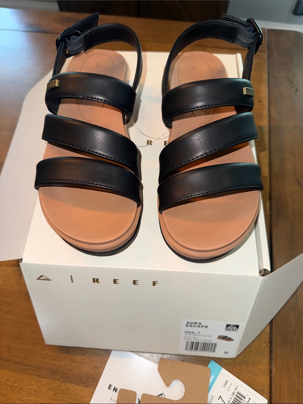 Reef Aura Escape Black Triple-Strap Sandals with Tan Footbed
